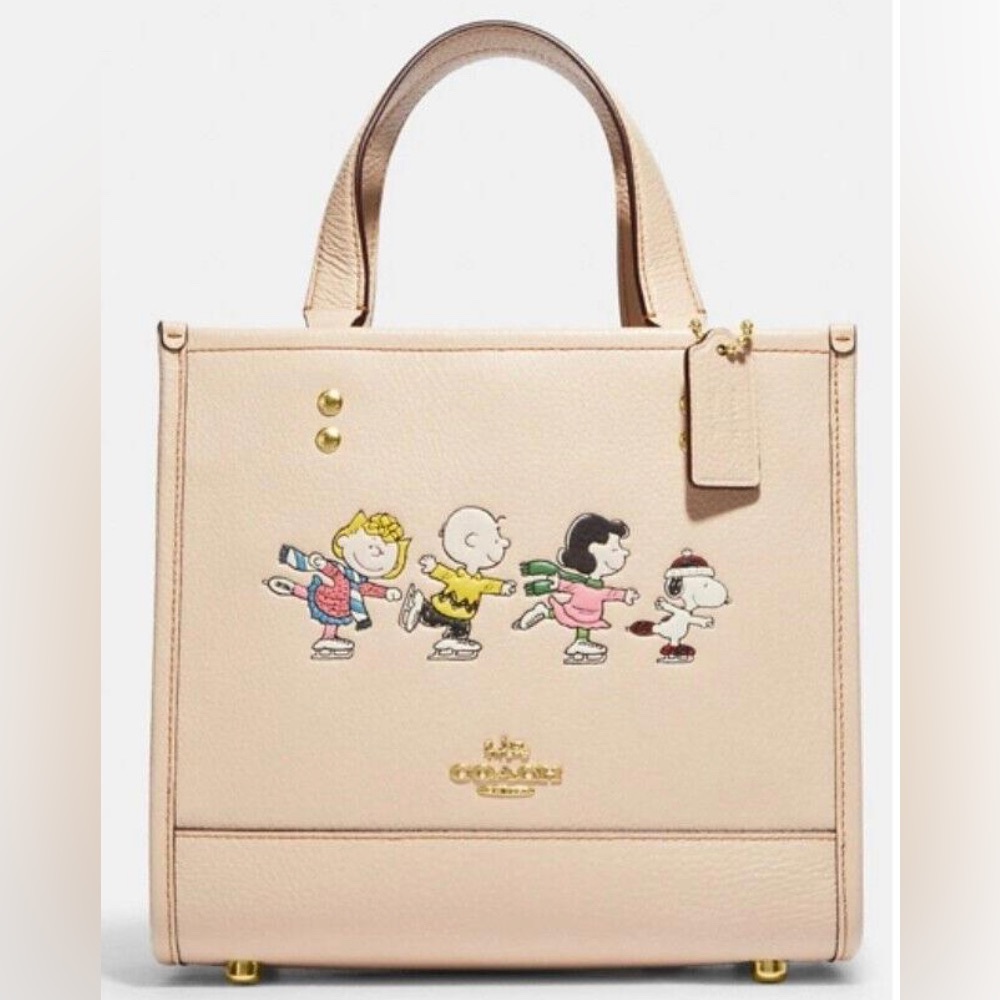 ❌❌SOLD❌❌Coach X Peanuts Dempsey Tote 22- Snoopy And Friends Leather Bag in Ivory - Picture 1 of 7